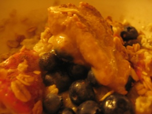 Oatmeal with strawberries blueberries, organic pb & udi's granola